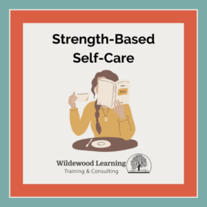 Illustration of a woman with long hair holding a cup and reading a book at a table. Text reads Strength-Based Self-Care and Wildewood Learning Training & Consulting with a tree logo.
