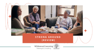 Four women sit together in a cozy room, talking and smiling over tea and books. Text reads Strong Ground [Review] and Wildewood Learning Training & Consulting with a tree logo.